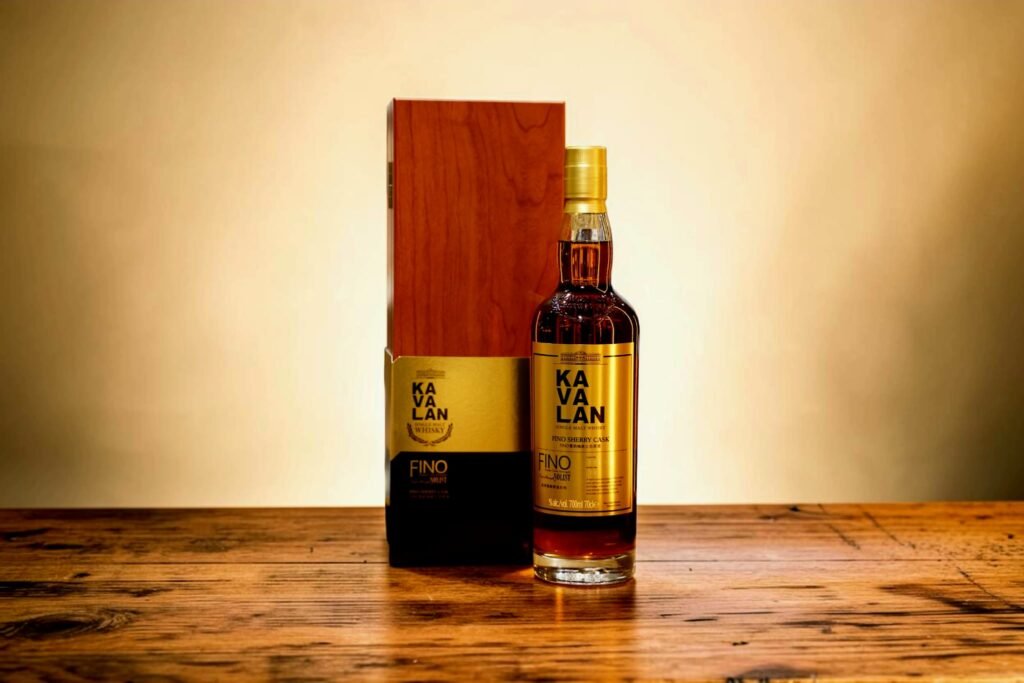 Kavalan Solist Fino Sherry Cask bottle and presentation box on a wooden table during Dram1 Kavalans Solist Fino Sherry Cask Review