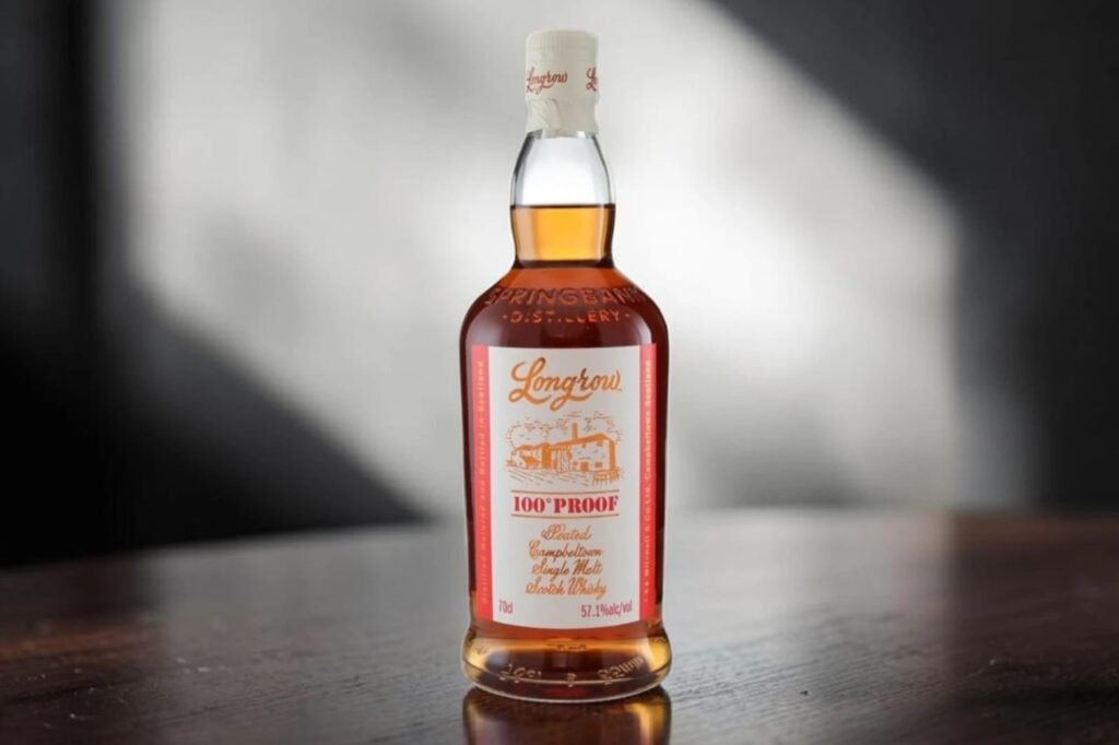 Longrow 100 Proof whisky bottle beside a dram glass during a Longrow 100 Proof Review on Dram1